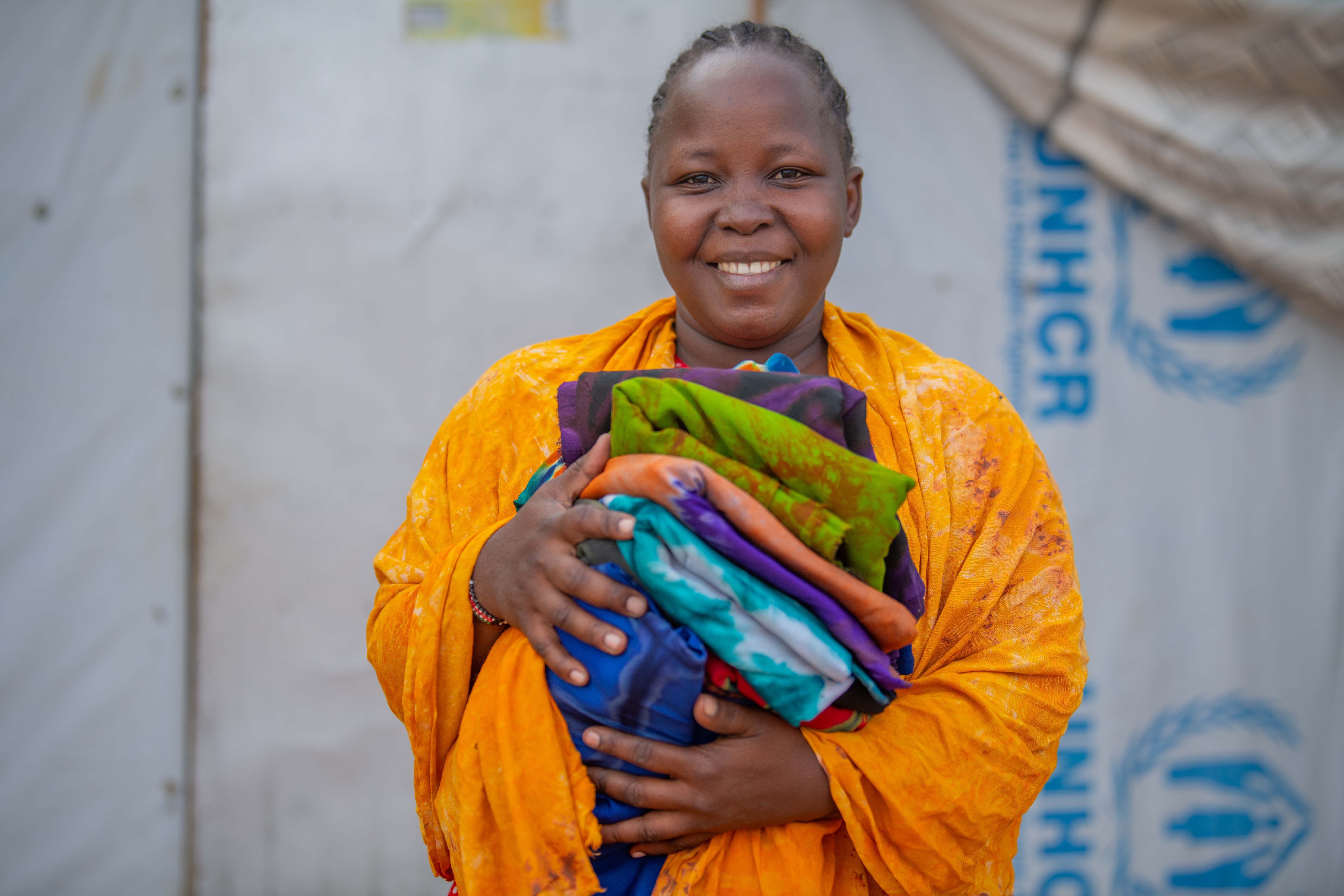 Ellah Loice runs a tie-and-dye business from her home in Hagadera, Dadaab
