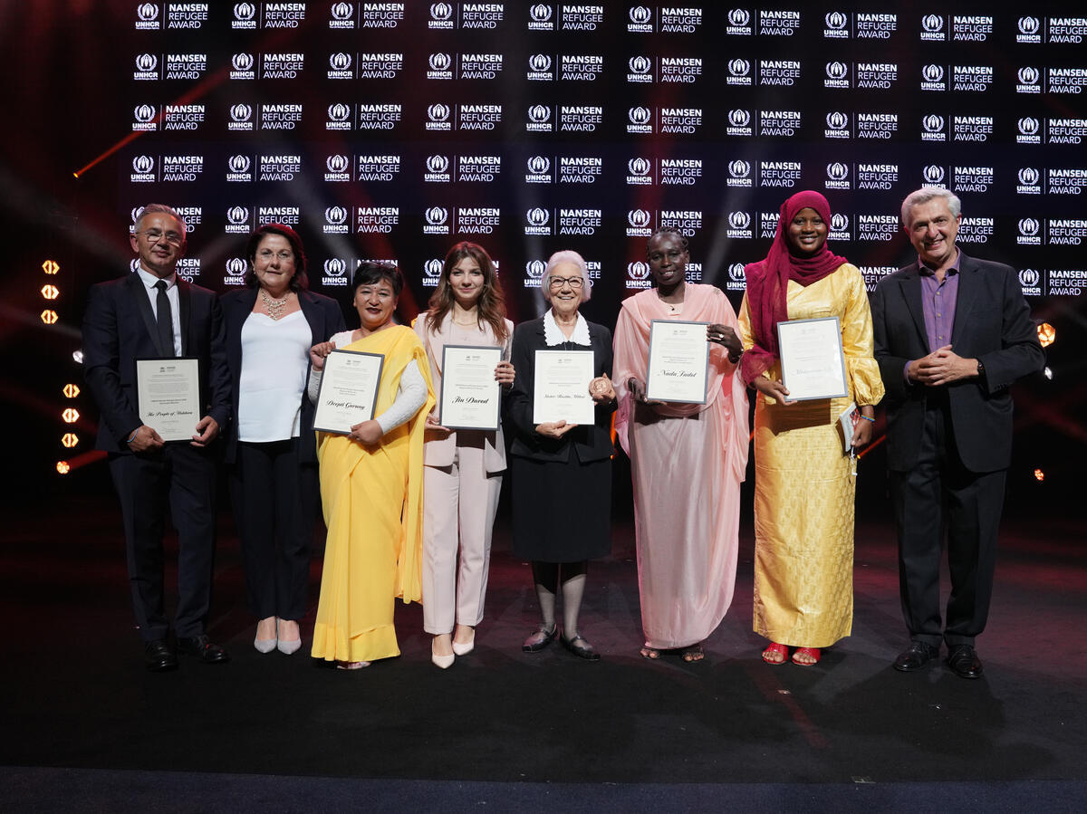 UN High Commissioner for Refugees Filippo Grandi with the UNHCR Nansen Refugee Award to the 2024 Global Laureate, Sister Rosita Milesi, and regional winners.