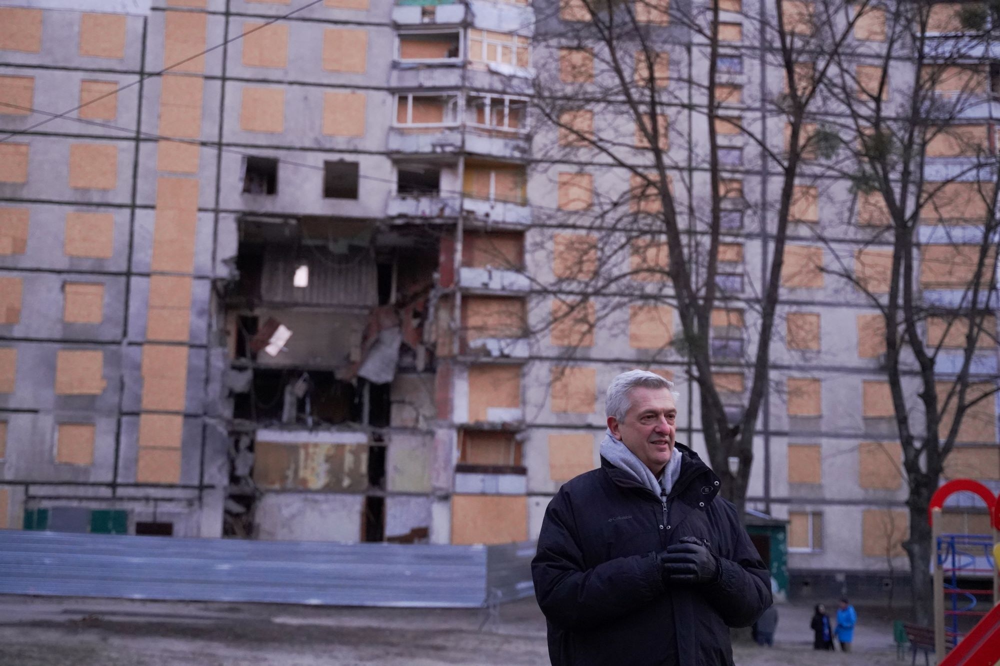 Ukraine. UN High Commissioner for Refugees Filippo Grandi visits an attack site in residential area in Kharkiv.