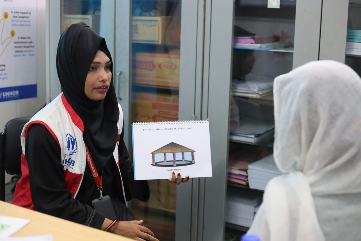 Bangladesh. Umme Salama, 20, conducts an individualised counselling session for Rohingya refugee at a primary healthcare centre in Cox's Bazar, part of UNHCR's mental health and psychosocial support (MHPSS) programme