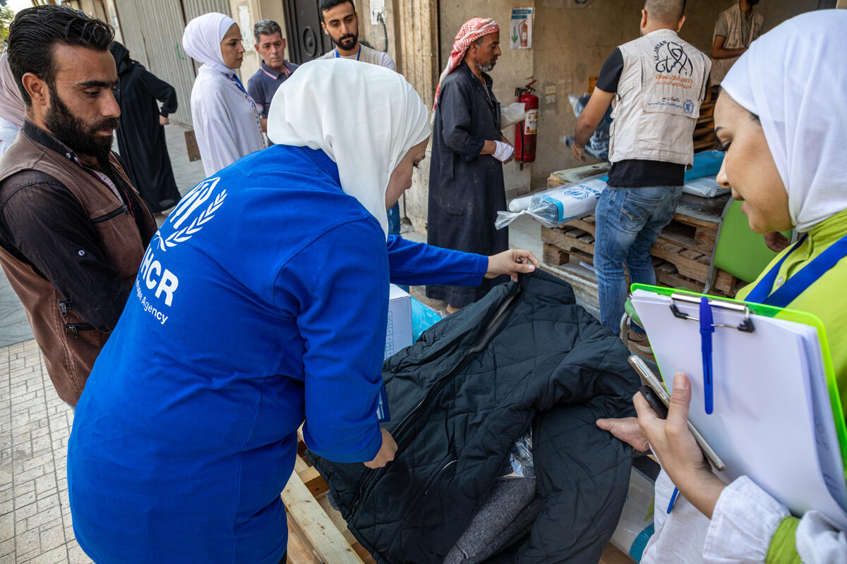 Syria. UNHCR distributes winter non-food items in Aleppo city.