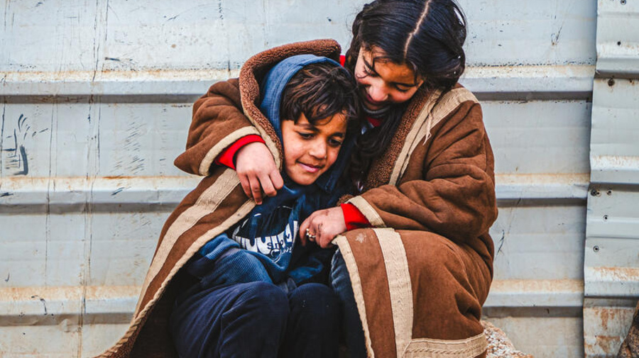 Jordan. Smiling Through the Harsh Winter in Zaatari camp.