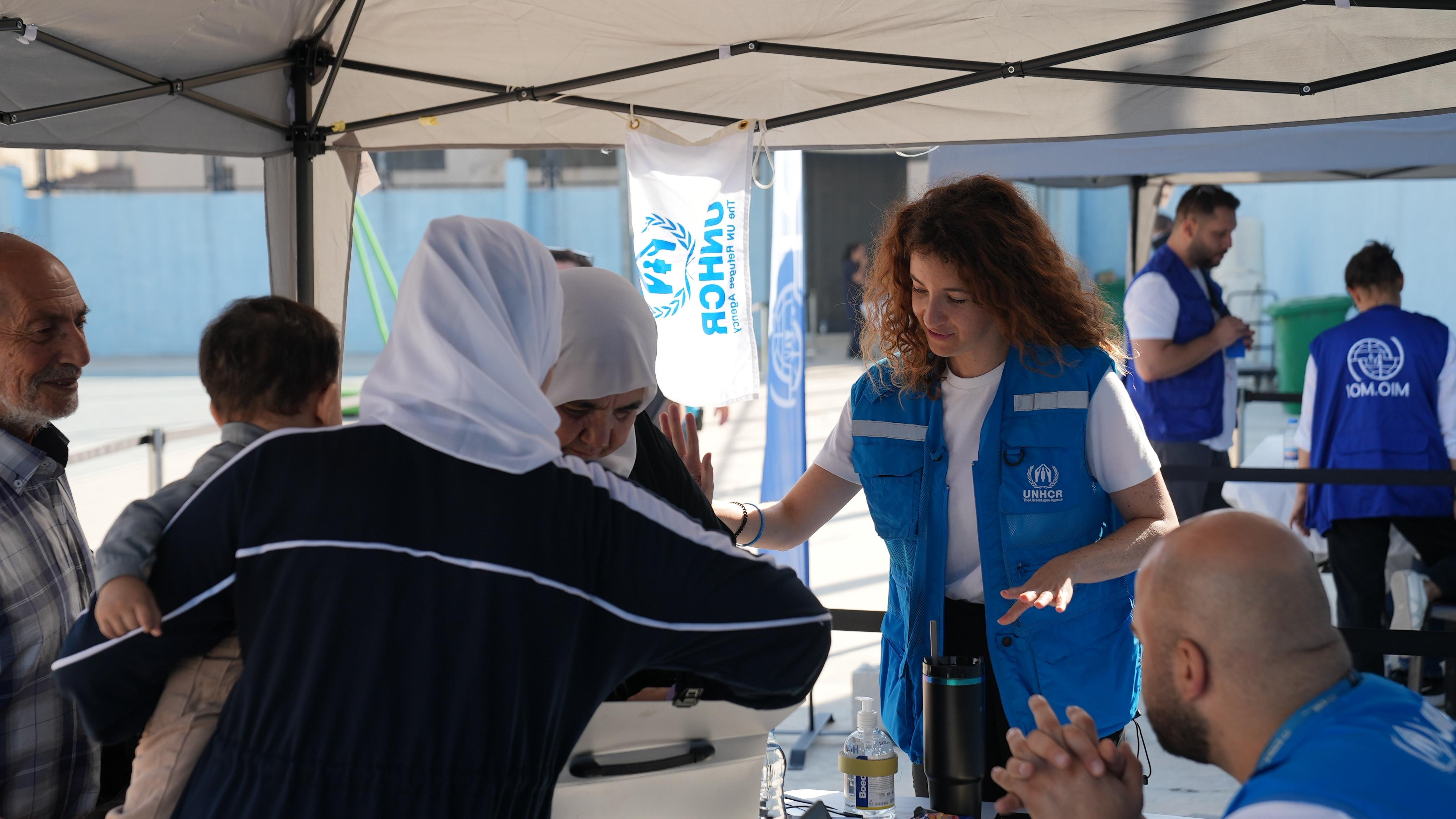 UNHCR staff supporting refugees returning from Lebanon to Syria