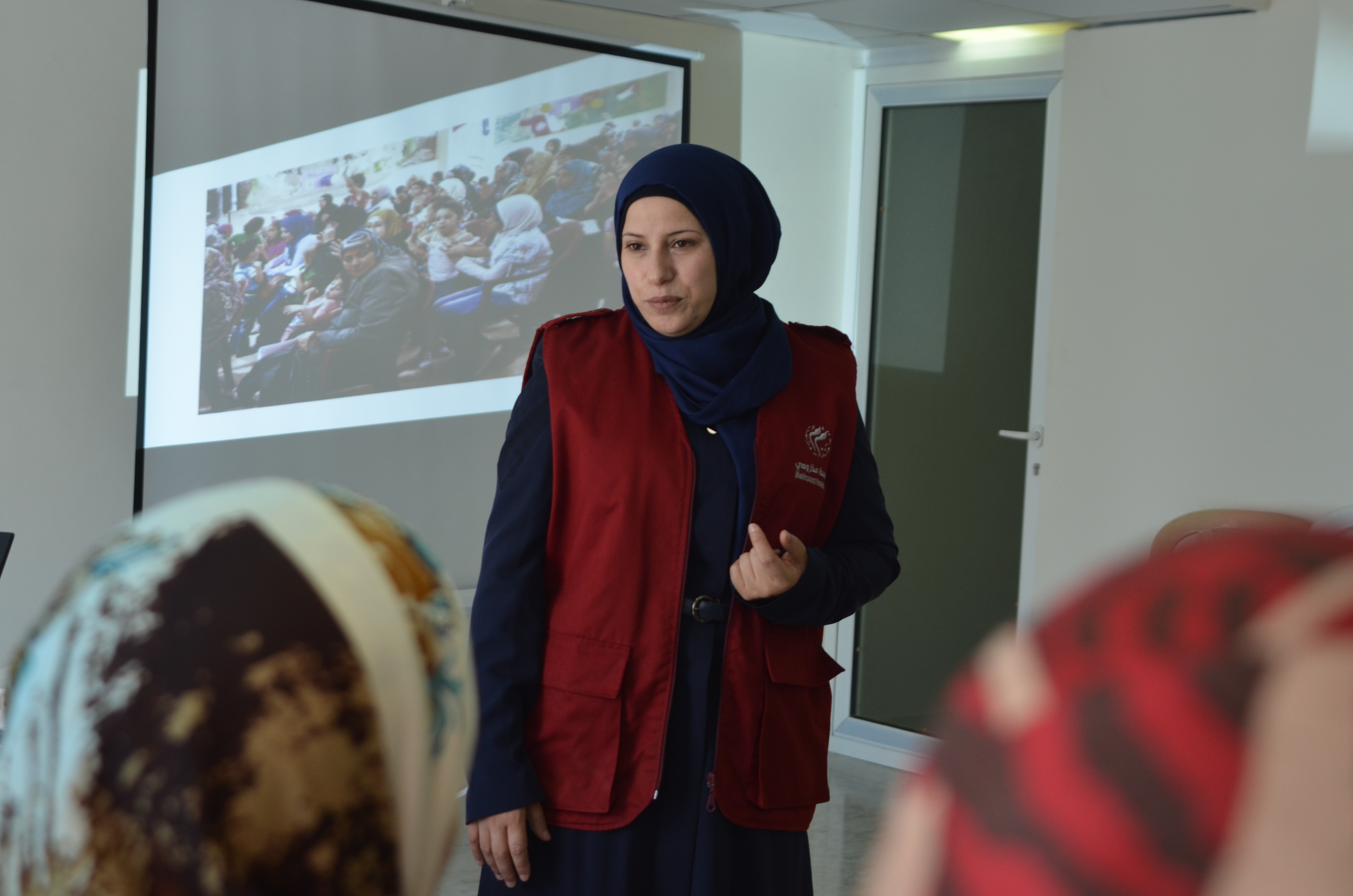 Outreach volunteers empower women to face challenges of life in exile