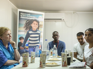UNHCR Assistant High Commissioner for Protection Gillian Triggs is discussing with a group of asylum seekers in the Closed Controlled Access Centre on Samos island, Greece.