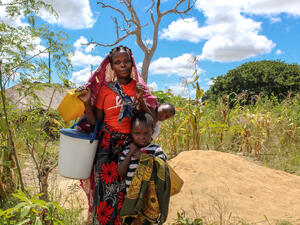 Mozambique. Displaced mother with her children in Cabo Delgado.