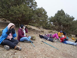 Morocco. Refugee women climbing the Toubkal.