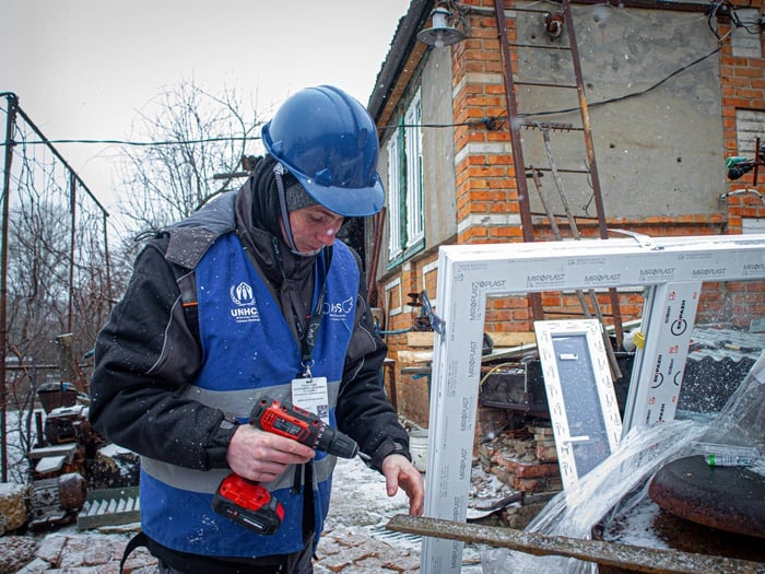 People fixing houses
