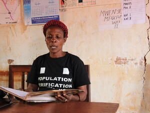 Mwavita Mlasi, in the office of the Executive Committee at Nyarugusu Refugee Camp, uses her position as vice president to help people find solutions to their problems.