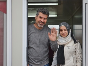 Former Yugoslav Republic of Macedonia. Syrian refugee Shergo and his daughter Avin with a rare smile on their faces