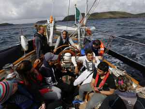 Ireland. A group of teenagers from Ireland and Syrian Asylum seekers participate in sail training off the coast of West Cork