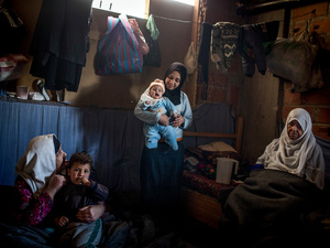 Syria. Displaced persons living in an unfinished building in rural Damascus