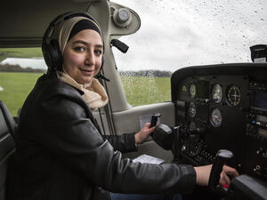 United Kingdom. Young Syrian refugee learns to fly