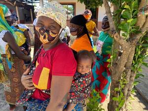 Mozamique. Suabo, a midwife residing in a IDP settlement of Cabo Delgado, takes care of her friend's baby during a PSEA training conducted by UNHCR