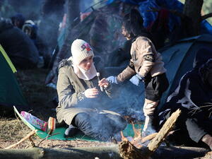 Refugees and migrants people gather on the Belarusian-Polish border