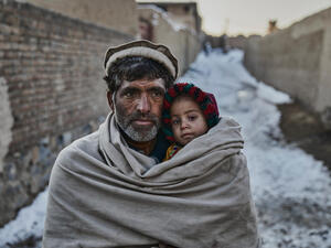 Afghanistan. Displaced families cope with winter cold and food shortages Kabul.