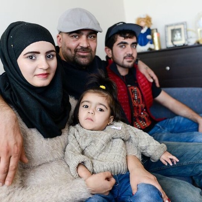 Canada. Newly arrived Syrian family at their home in Ottawa.