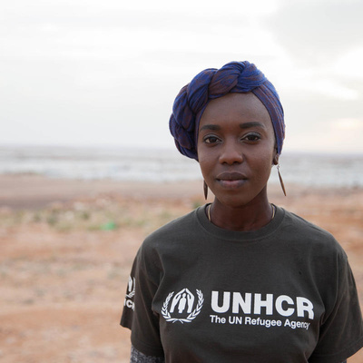 Portrait of UNHCR Goodwill Ambassador Emi Mahmoud against the backdrop of Azraq refugee camp in Jordan in March 2018.