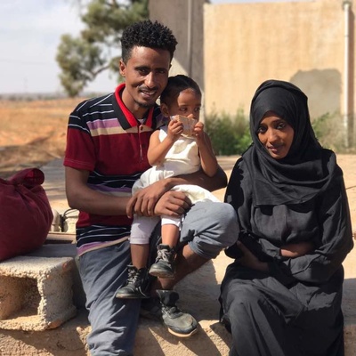 Refugees Mohamed and Mariam seen outside the detention center from where they were evacuated to Niger