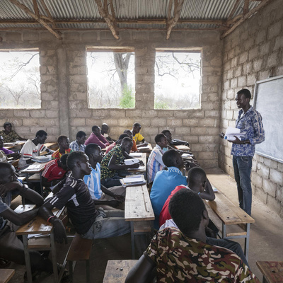 South Sudanese teacher Lim Bol teaches at a primary school in Kule refugee camp, Ethiopia, March 2016.