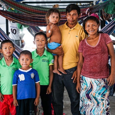 Euligio Baez, a Warao leader from Venezuela, poses with his family in Boa Vista, Brazil