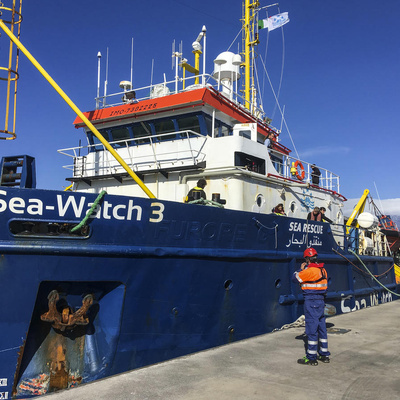 Italy. Rescued refugees and migrants disembark after marathon ordeal