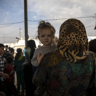 Iraq. Syrian refugees fleeing military campaign receive aid at UNHCR camp