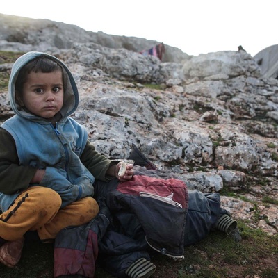 Syria. Young displaced boy fleeing violence near Idlib