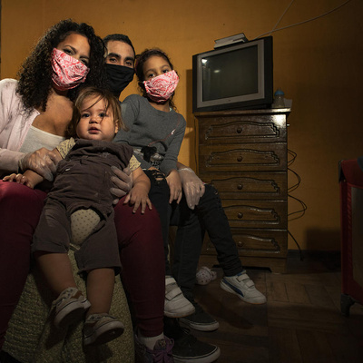 A displaced Venezuelan family who lost their income during COVID-19 pictured in their home in Santiago, Chile, in May 2020.