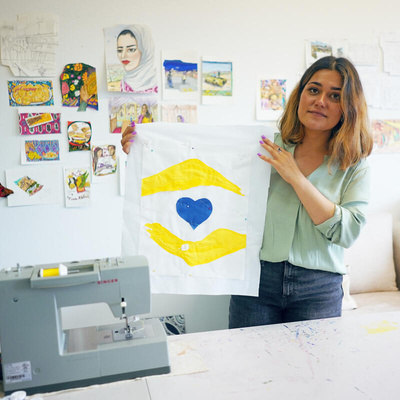 United States. Afghan refugee design World Refugee Day logo