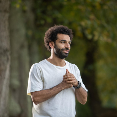 Egypt. Liverpool striker Mo Salah pays a virtual visit to refugees and local children studying in a classroom