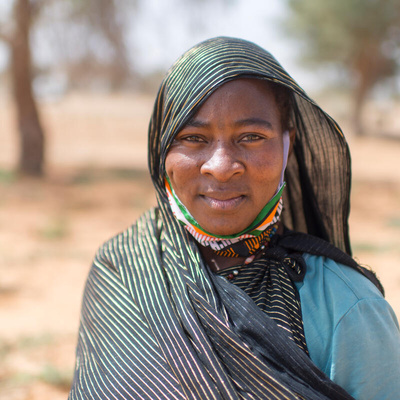 Rabi Saley, 35, who fled Mali after attacks on her hometown, found refuge in Ouallam, Niger, where she works on a market garden with other refugee, displaced and local women. 