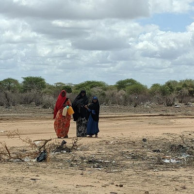 Somalia. Women carry water in the desert in Dhobley during the Drought situation.