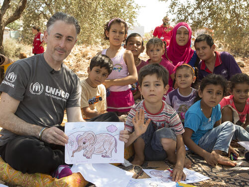 Lebanon. UNHCR High Profile Supporter Alan Cumming visits mobile library at Rass Maska informal settlement.