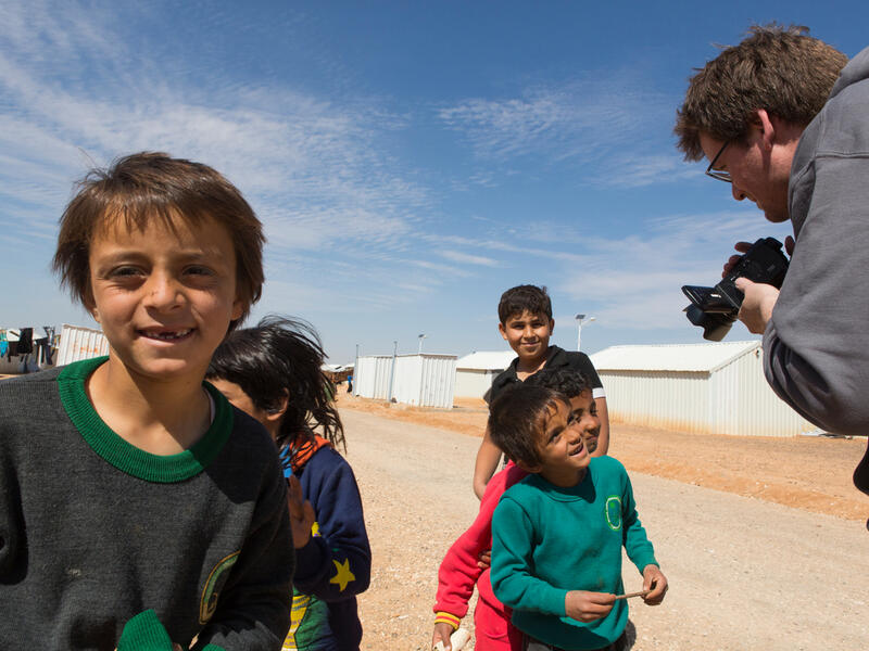 Jordan. UNHCR High Profile Supporter John Green in Azraq refugee camp
