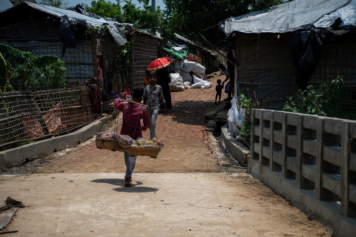 A vendor walks through one of the camps in Teknaf, Cox’s Bazar.