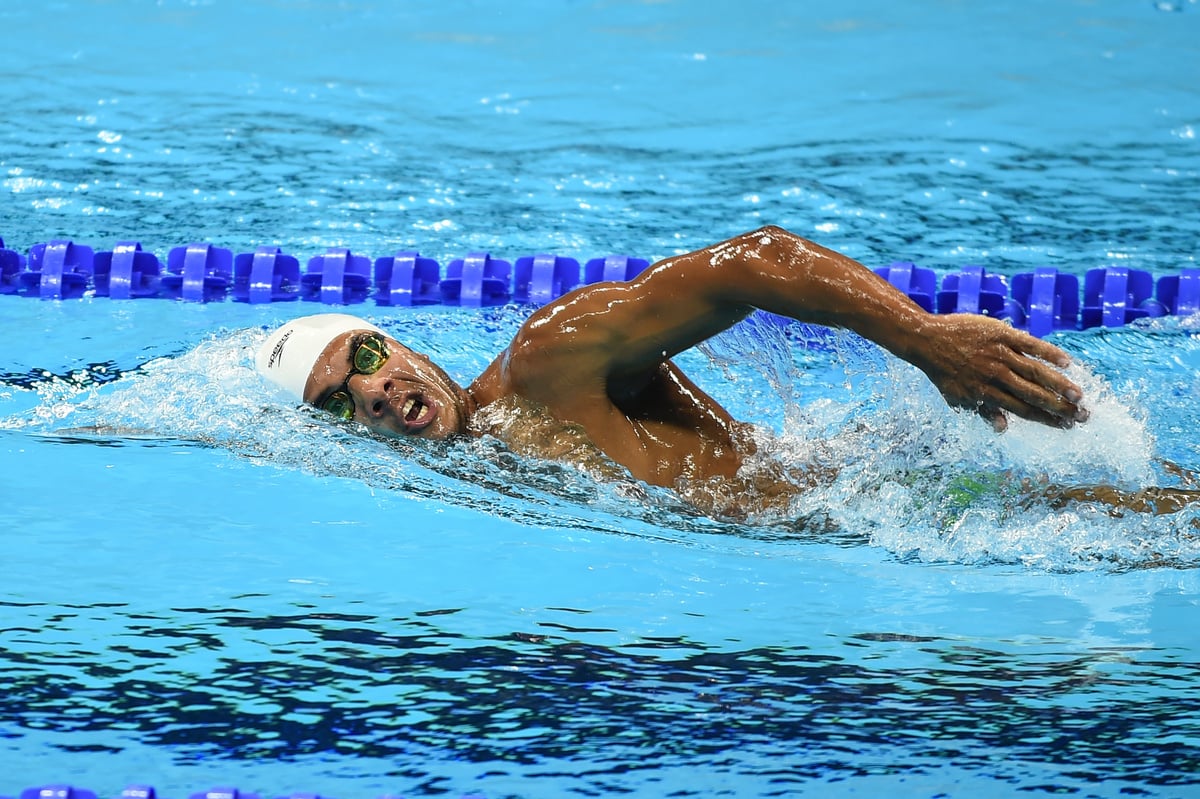 Brazil. Syrian refugee swimmer, Rami Anis, warms up in the Olympic pool in Rio