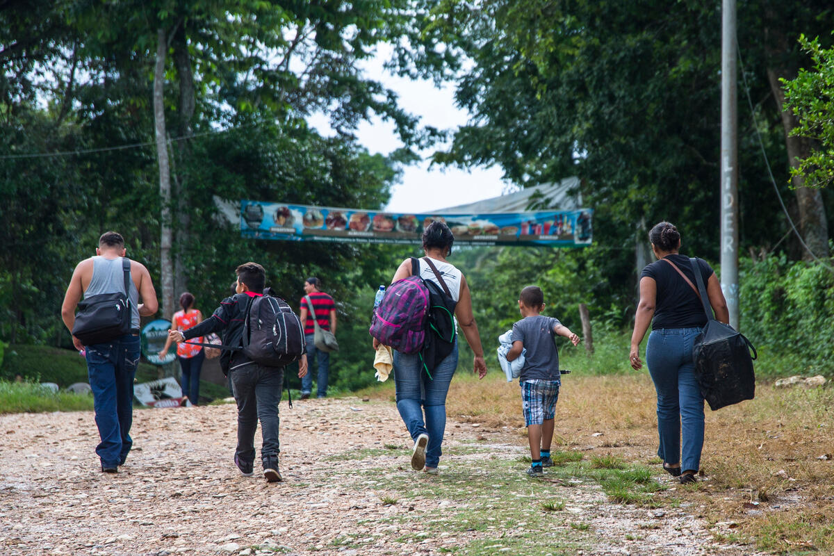 Guatemala. Refugees arrive at the Mexican border