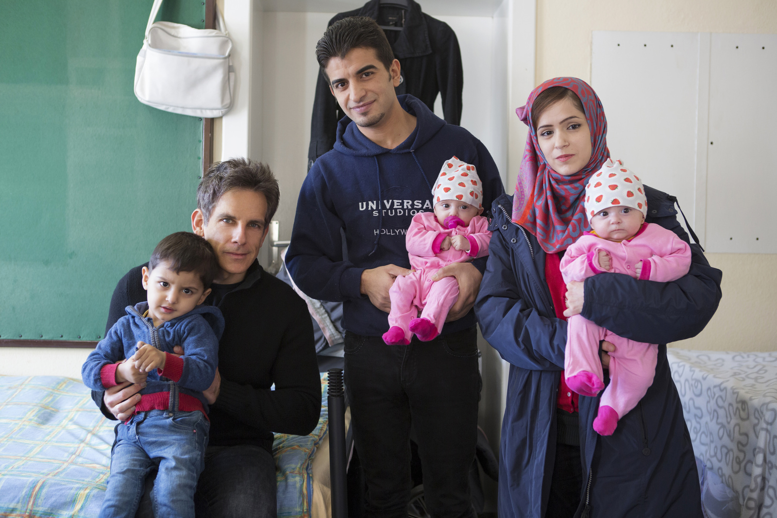 Germany. Actor Ben Stiller meets Nahed and her family at an emergency shelter in Berlin