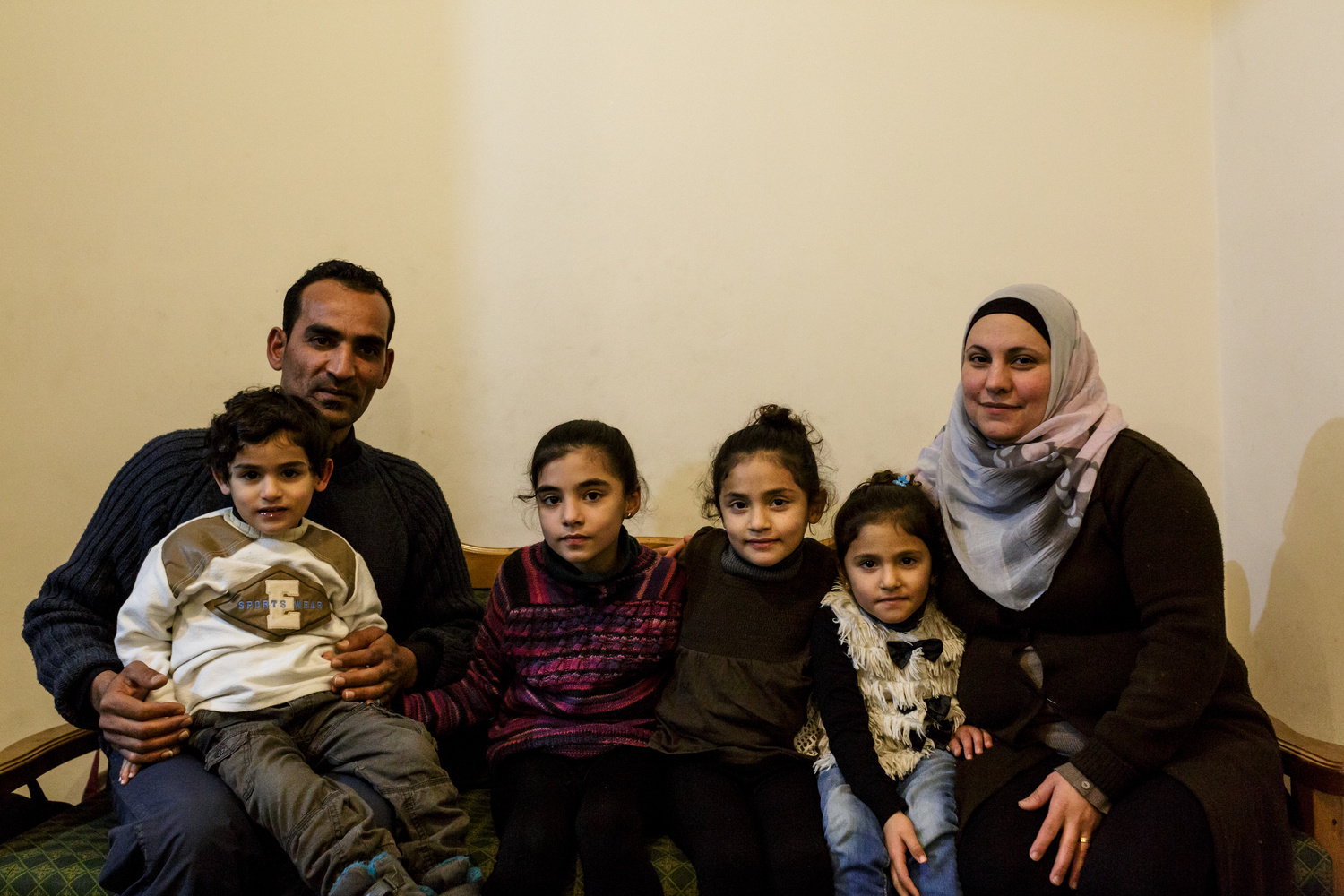 Greece. The Syrian electrician installing power at Lesbos refugee camp