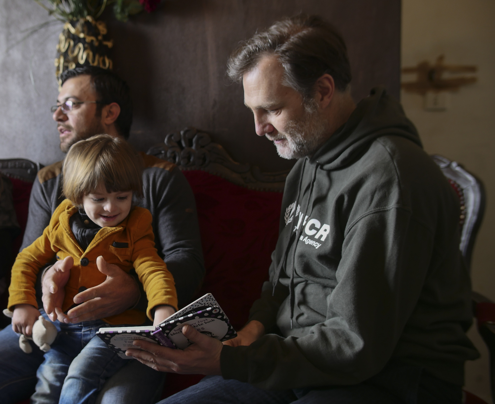 UNHCR Goodwill Ambassador David Morrissey meets Syrian refugees Talal Khaled Marwan (aged 32), his wife Maha (26) and their son Hisham in Lebanon