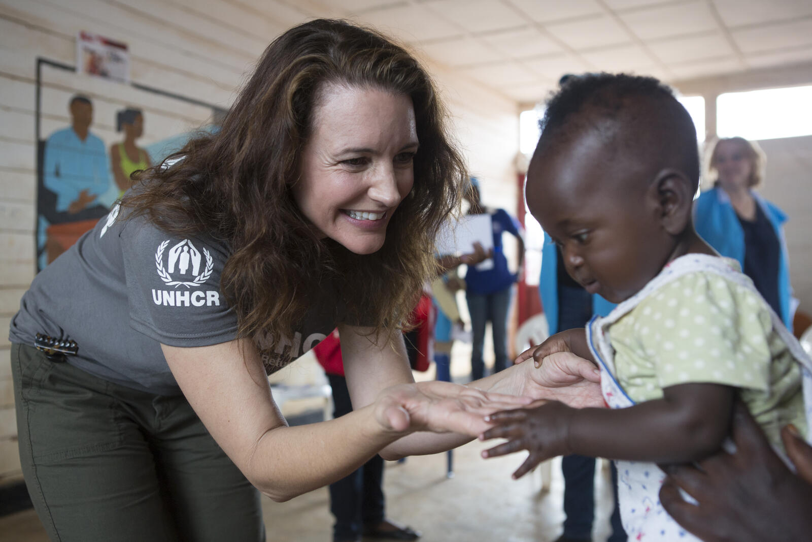 Rwanda. UNHCR Goodwill Ambassador Kristin Davis meets a women survivors project