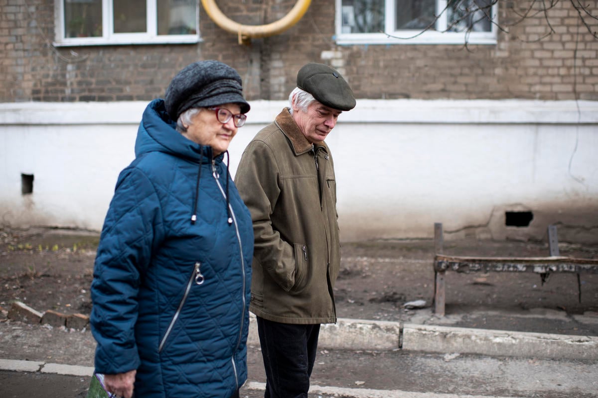 Ukraine. Internally displaced persons stand outside the apartment they are renting on the government-controlled side of the Donbas area