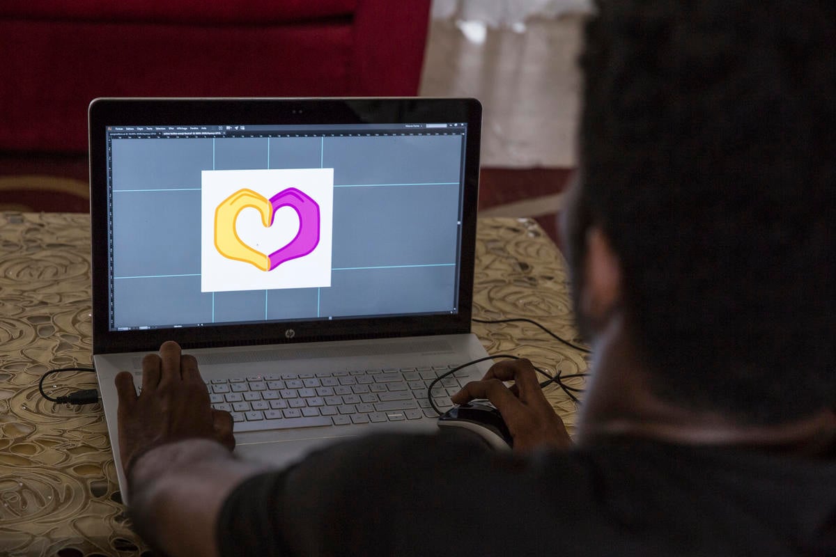 Côte d'Ivoire. Ivorian graphic designer produces emoji for World Refugee Day