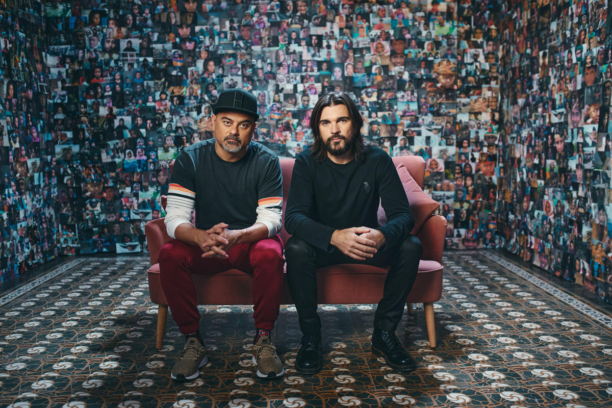 The video for the song "Pasarán," by Spanish rapper Nach (left) and Colombian singer Juanes (right), was a highlight of Monday's virtual ceremony.