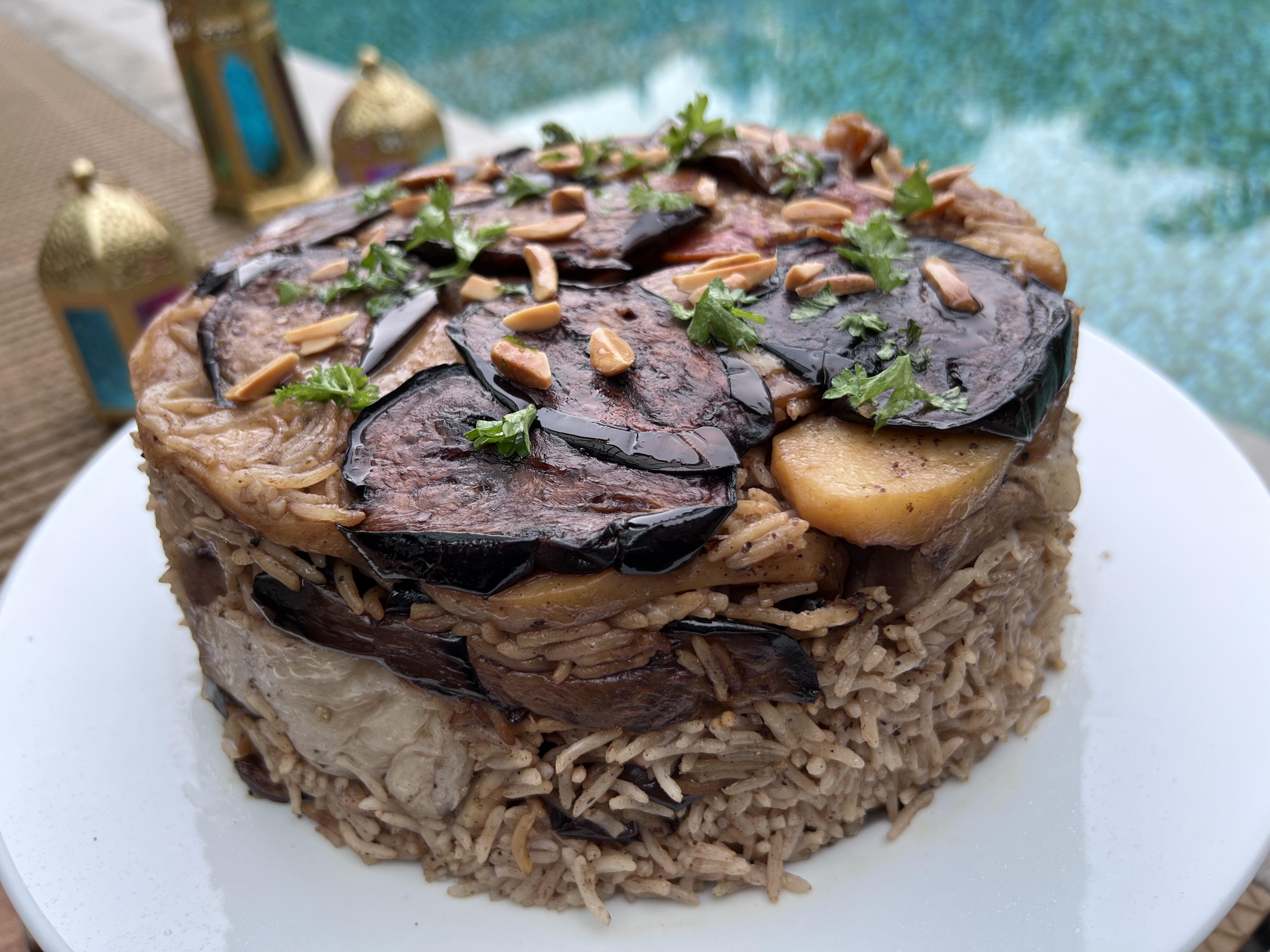  Maqlooba, a traditional Palestinian dish of richly spiced rice, vegetables, and stewed meat.