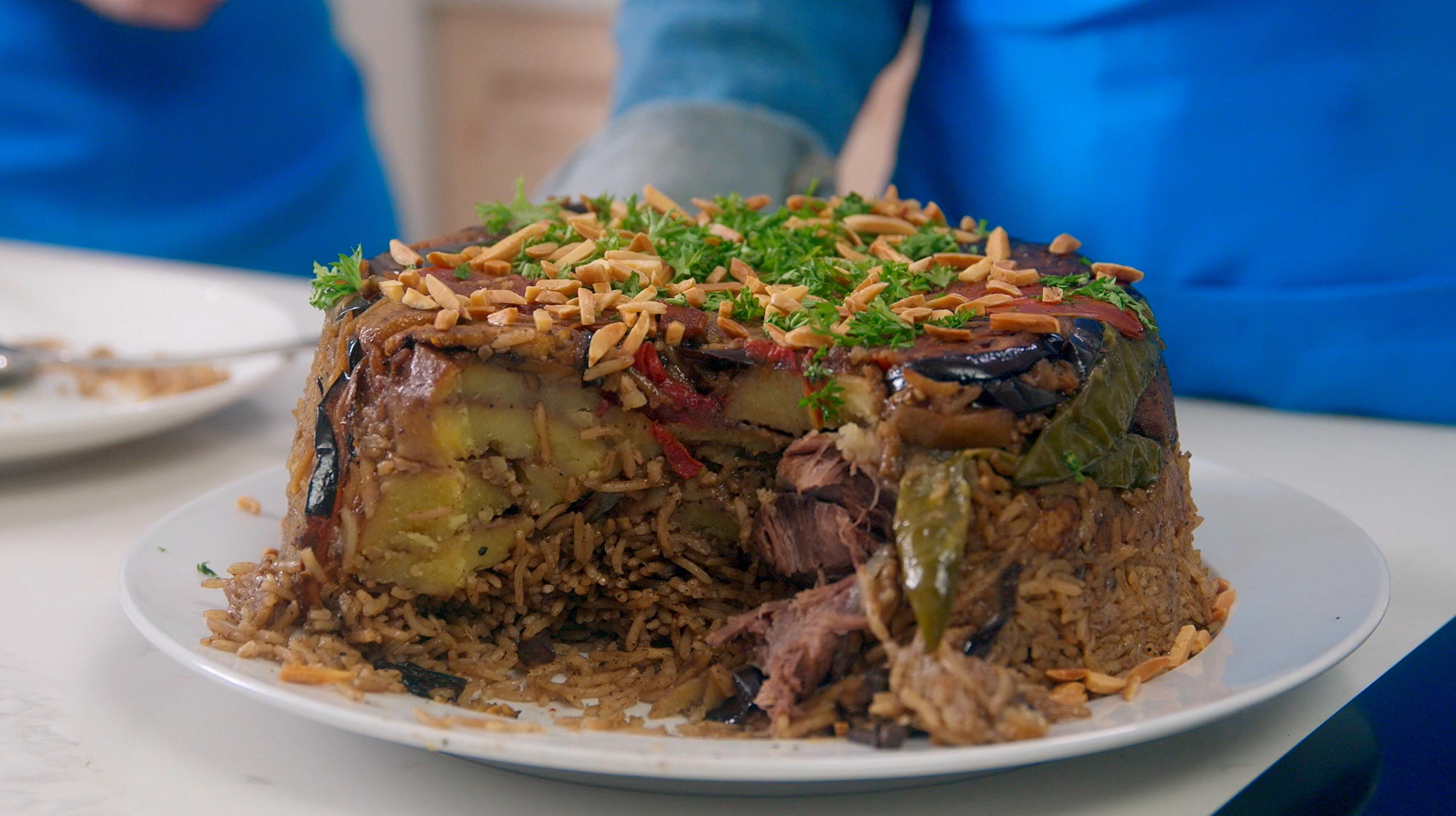  Maqlooba, a traditional Palestinian dish of richly spiced rice, vegetables, and stewed meat.
