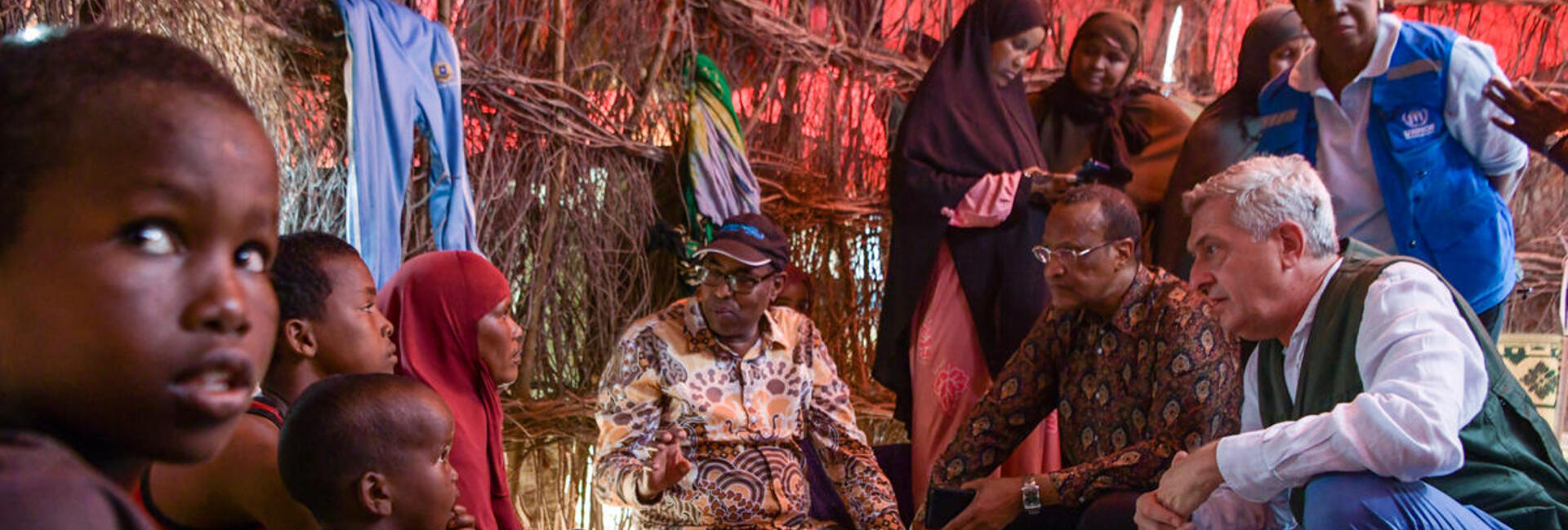 UN High Commissioner for Refugees Filippo Grandi visits a Somali family who recently arrived at a temporary site near Dagahaley refugee camp, Kenya.