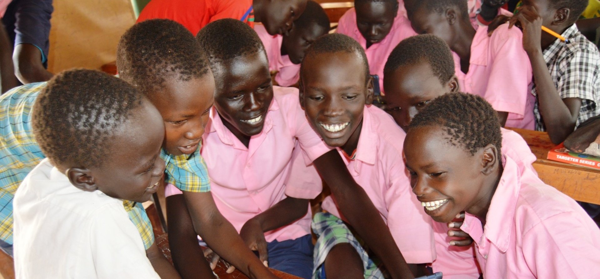Kenya. Students using tablets under the Instant Network Schools project in Kakuma Refugee Camp