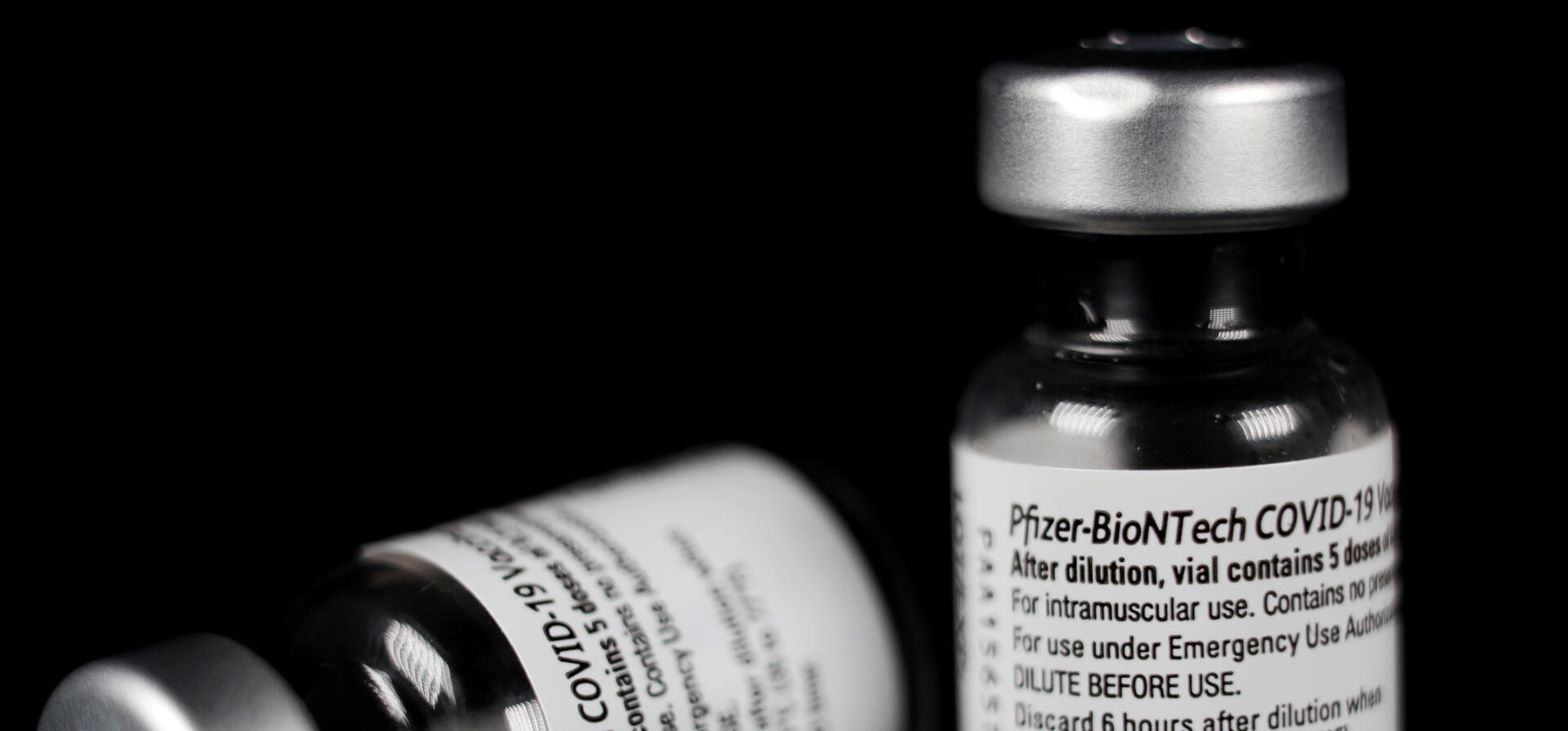 Empty bottles of Pfizer/BioNTech COVID-19 vaccine are pictured in Bad Windsheim, Germany December 27, 2020. 